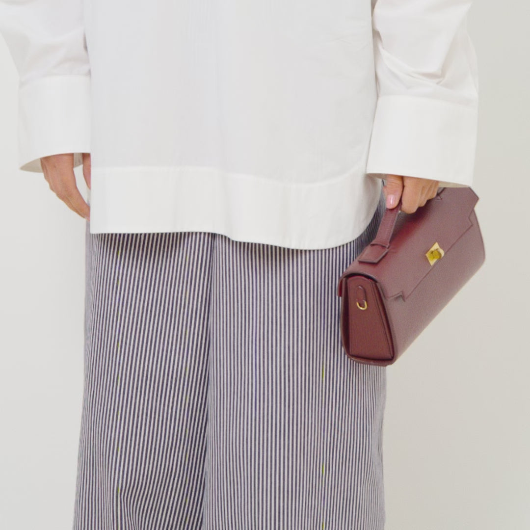 Mortimer Clutch -

          
            Crosshatch Leather in Barolo Red  -
          

          Anya Hindmarch US
