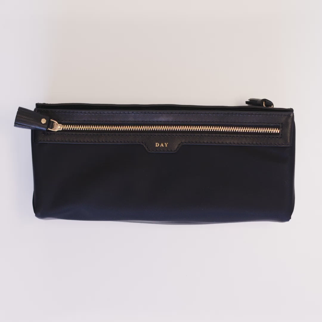Logo Night and Day Pouch -

          
            Recycled Nylon in Black -
          

          Anya Hindmarch US
