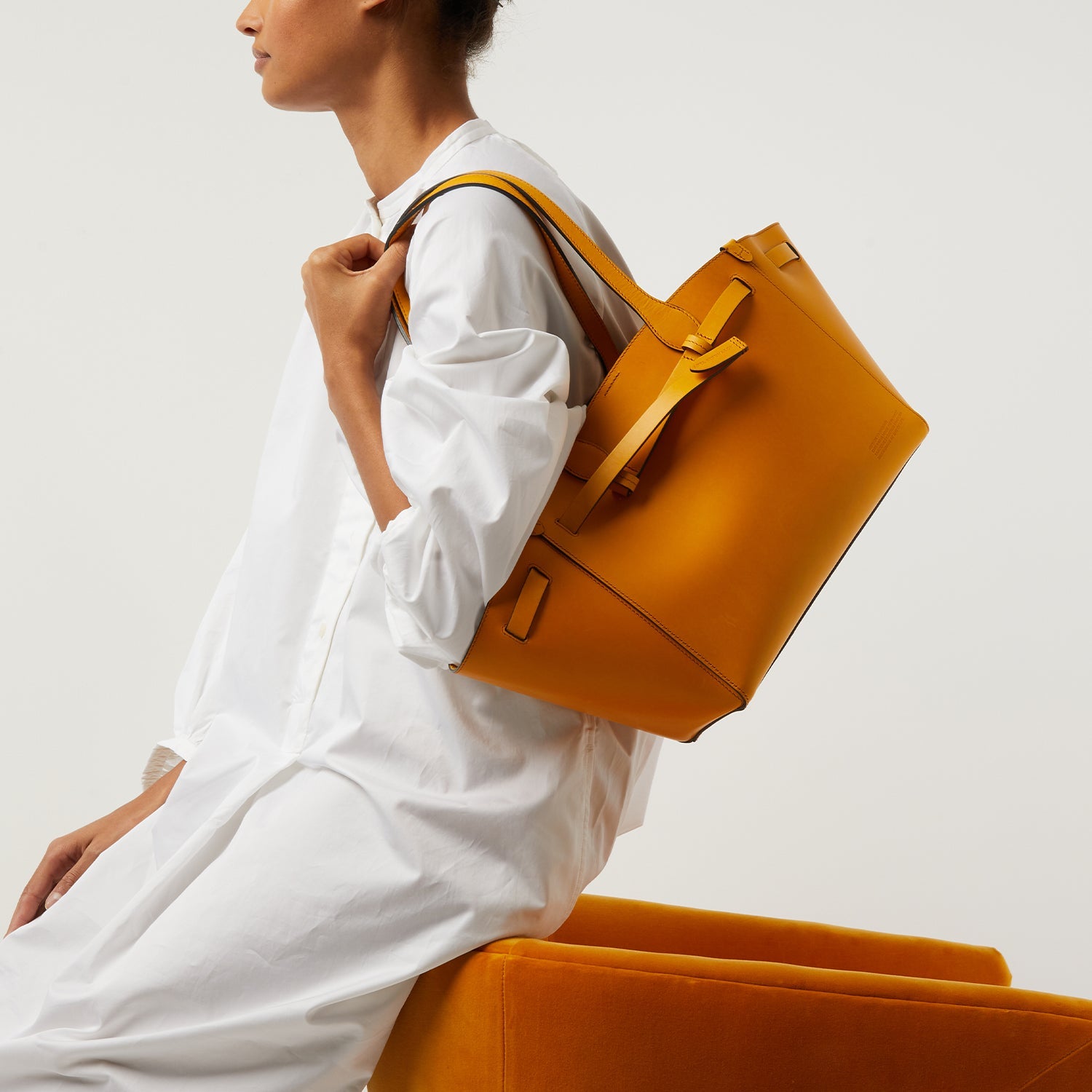 Return to Nature Tote Small -

                  
                    Compostable Leather in Honey -
                  

                  Anya Hindmarch US
