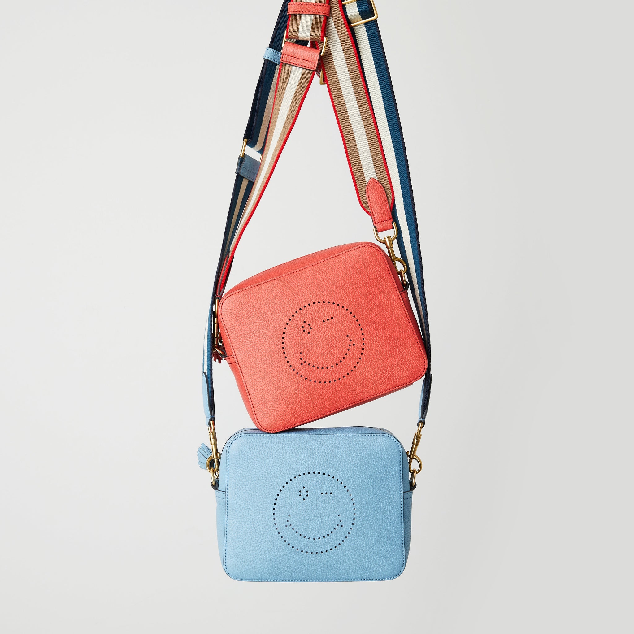 Wink Cross-body -

                  
                    Tumbled Leather in Forget Me Not -
                  

                  Anya Hindmarch US
