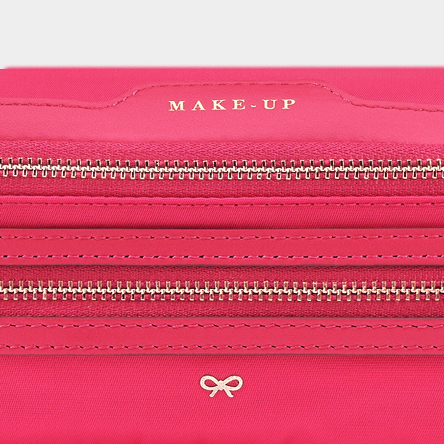 Make-Up Pouch -

                  
                    ECONYL® Regenerated Nylon in Hot Pink -
                  

                  Anya Hindmarch US
