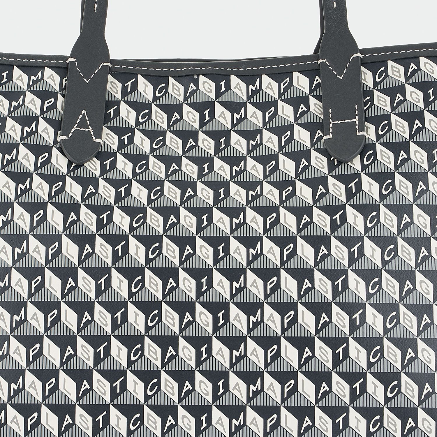 I Am A Plastic Bag Small Tote -

                  
                    Recycled Coated Canvas in Charcoal -
                  

                  Anya Hindmarch US
