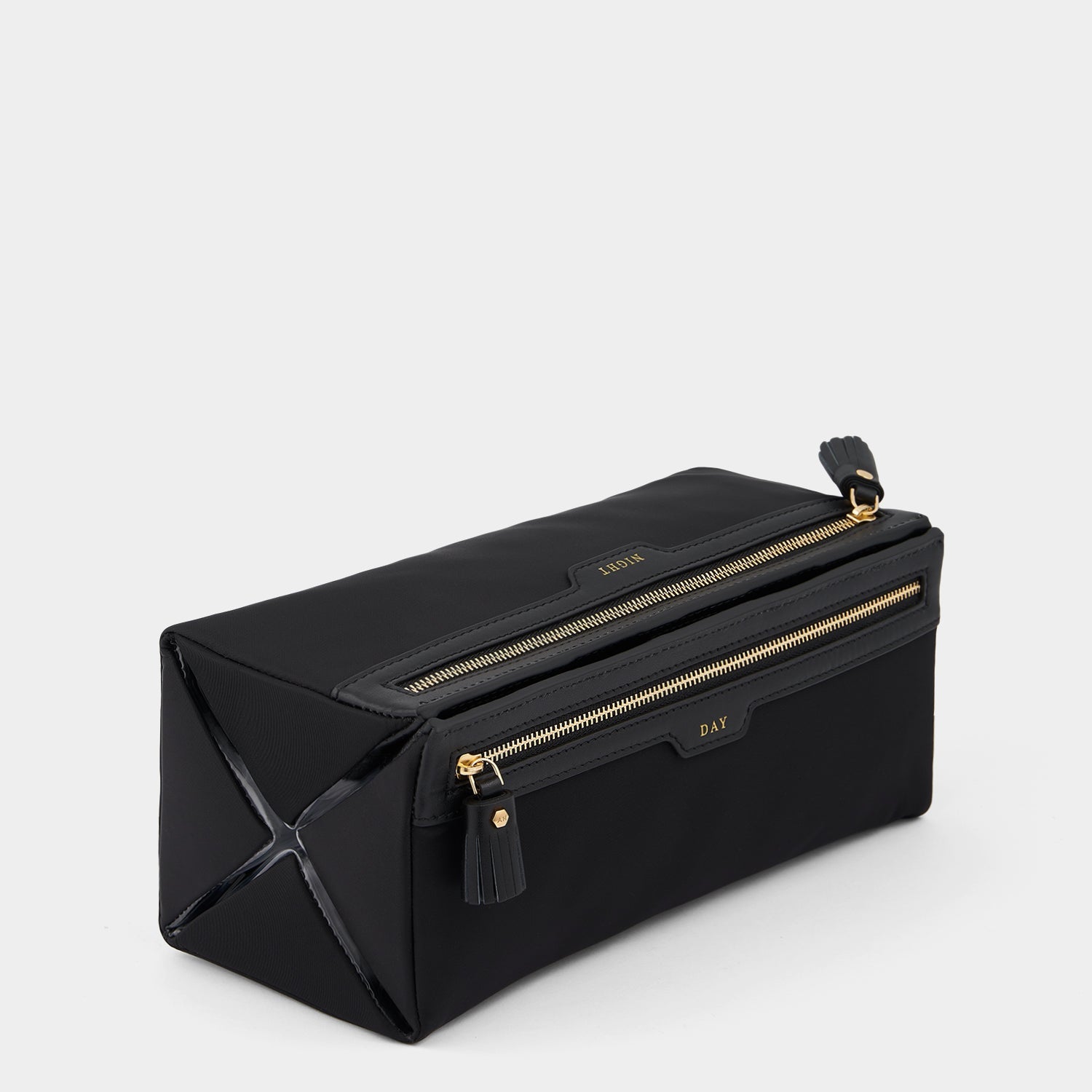 Night and Day Pouch -

                  
                    Econyl® Regenerated Nylon in Black -
                  

                  Anya Hindmarch US
