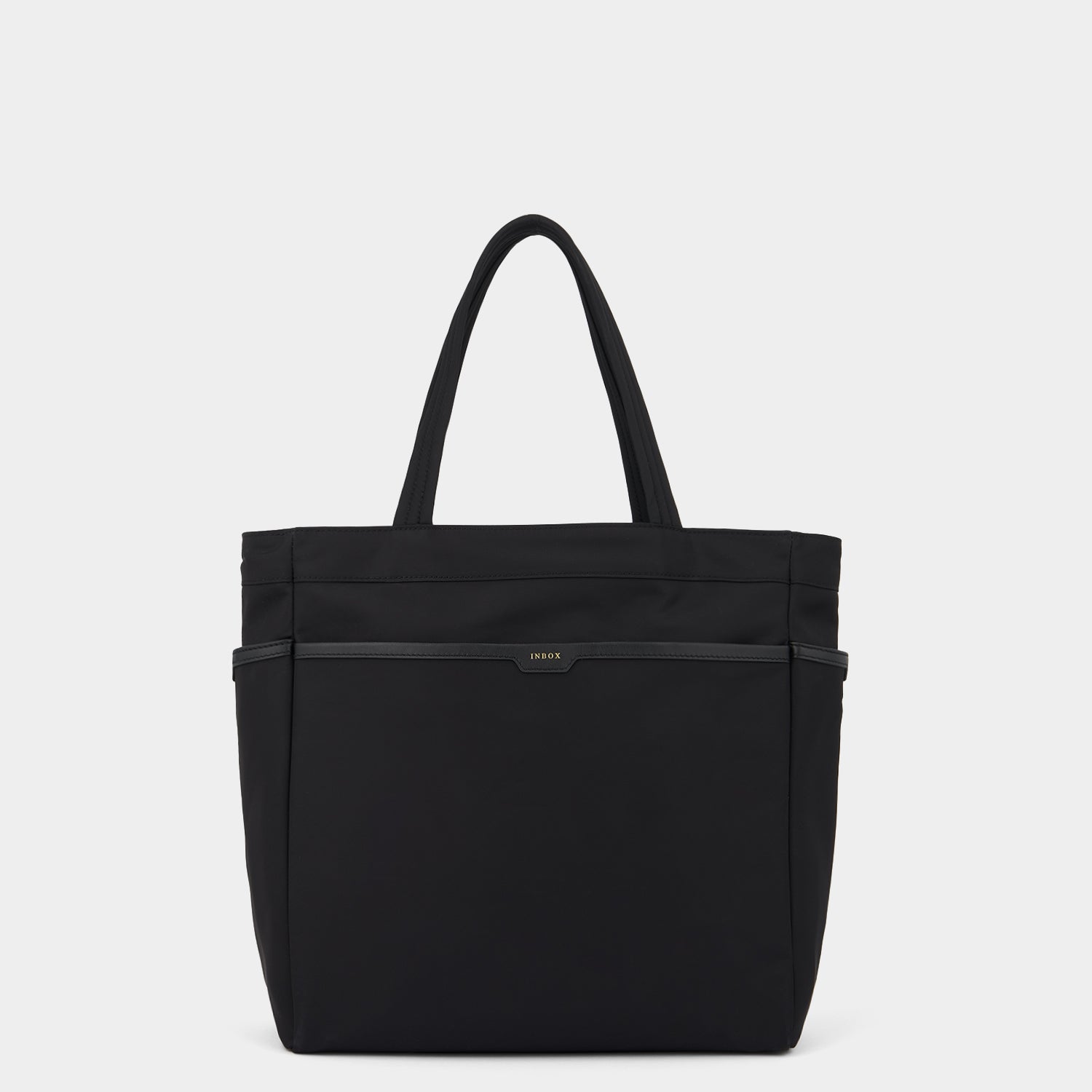 Commuter Tote Travel Bag -

                  
                    Regenerated Econyl® in Black -
                  

                  Anya Hindmarch US
