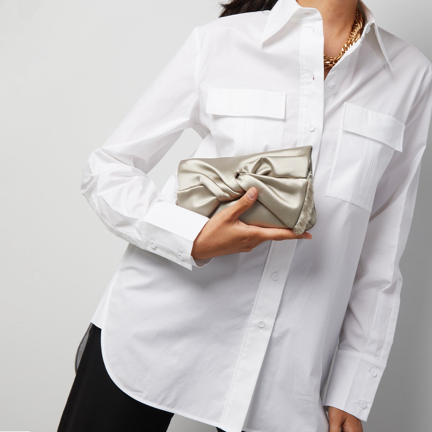 Bow Clutch -

                  
                    Satin in SIlver -
                  

                  Anya Hindmarch US
