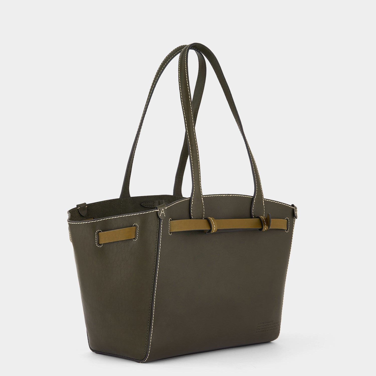 Return to Nature Tote Small -

                  
                    Compostable Leather in Dark Olive -
                  

                  Anya Hindmarch US
