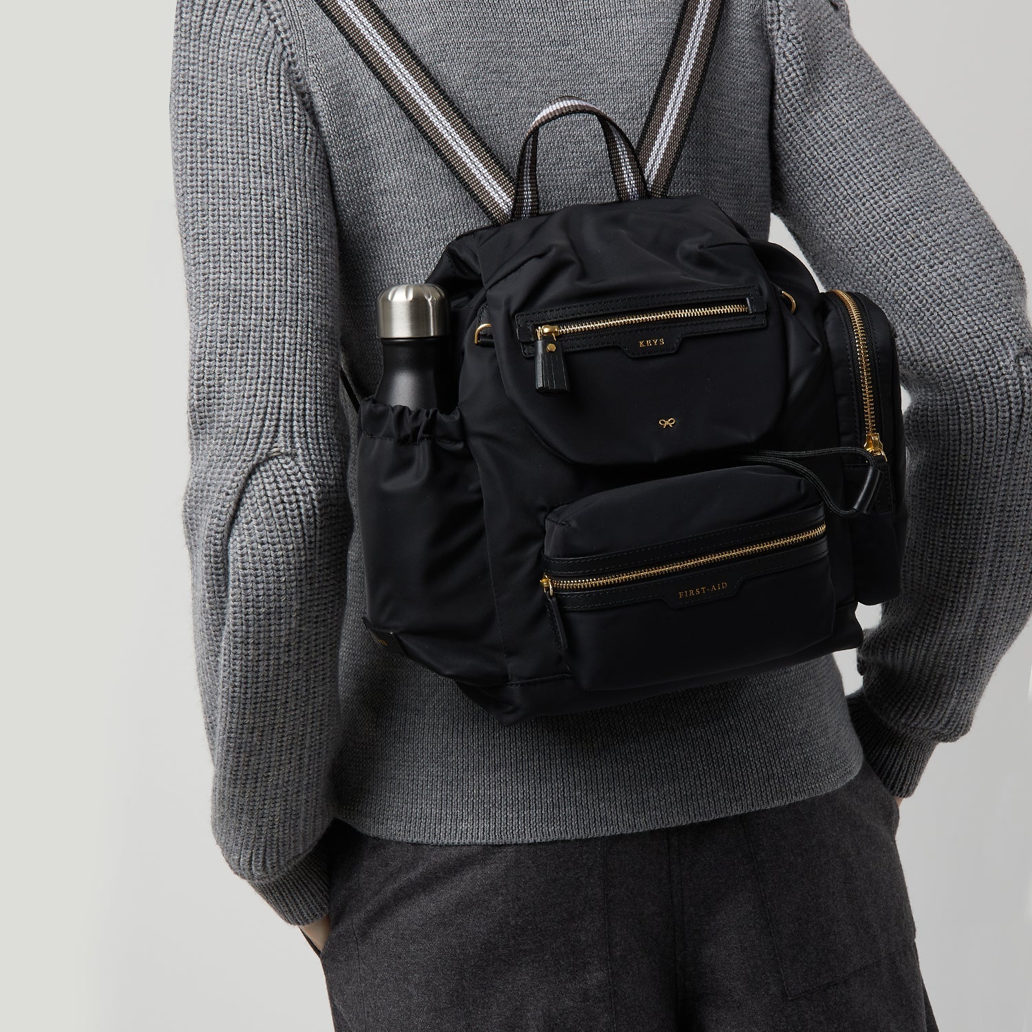 Walking Backpack -

                  
                    Econyl® Regenerated Nylon in Black -
                  

                  Anya Hindmarch US
