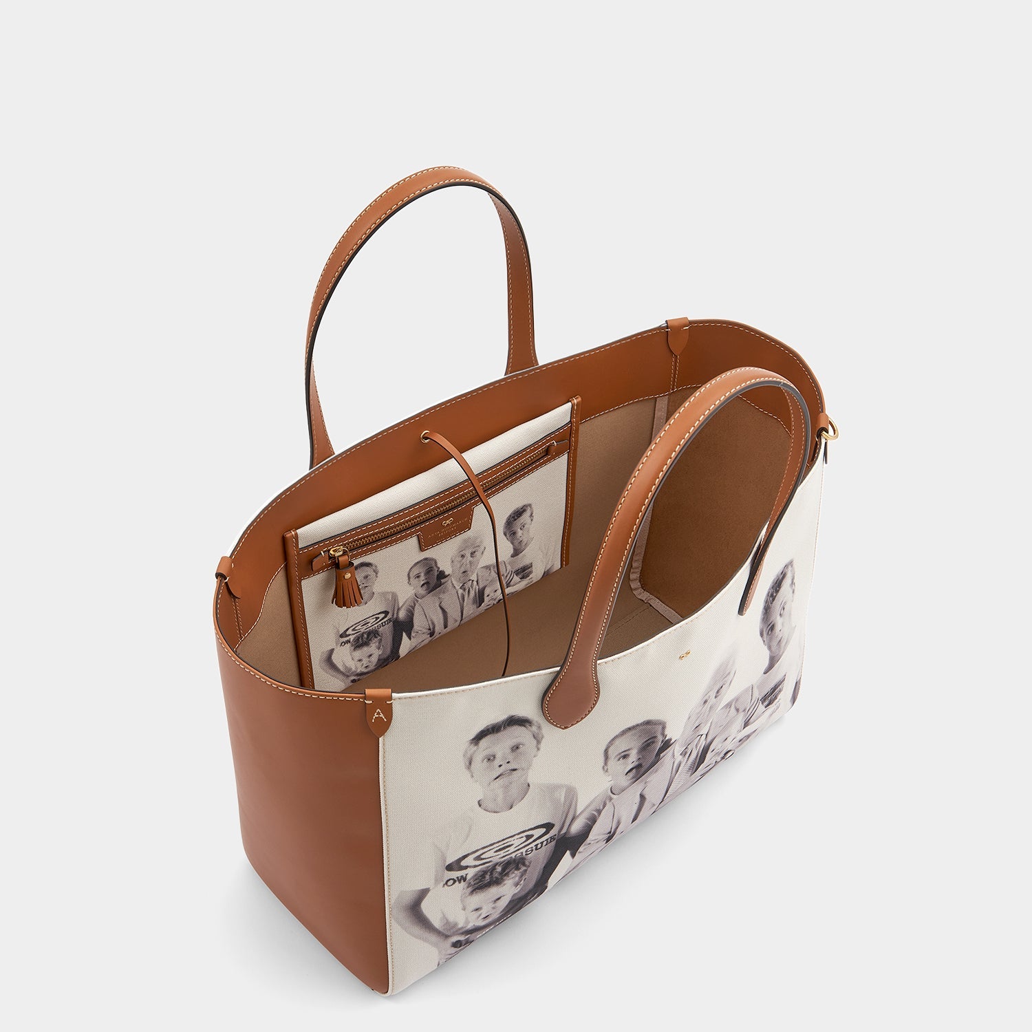 Be A Bag E/W Tote -

                  
                    Recyled Canvas in Tan -
                  

                  Anya Hindmarch US
