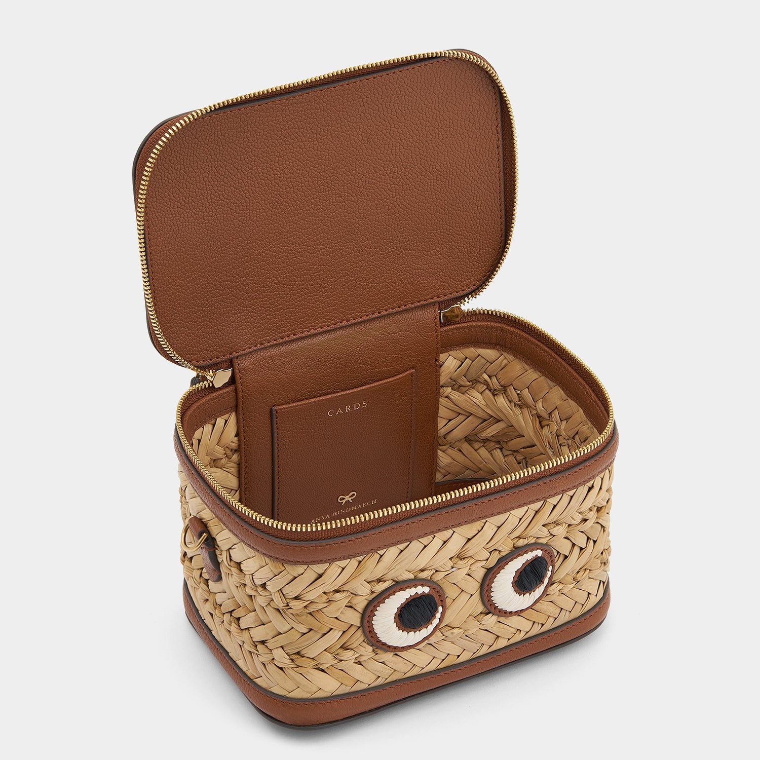 Bits and Bobs Eyes Cross-body -

                  
                    Seagrass and Capra Leather -
                  

                  Anya Hindmarch US
