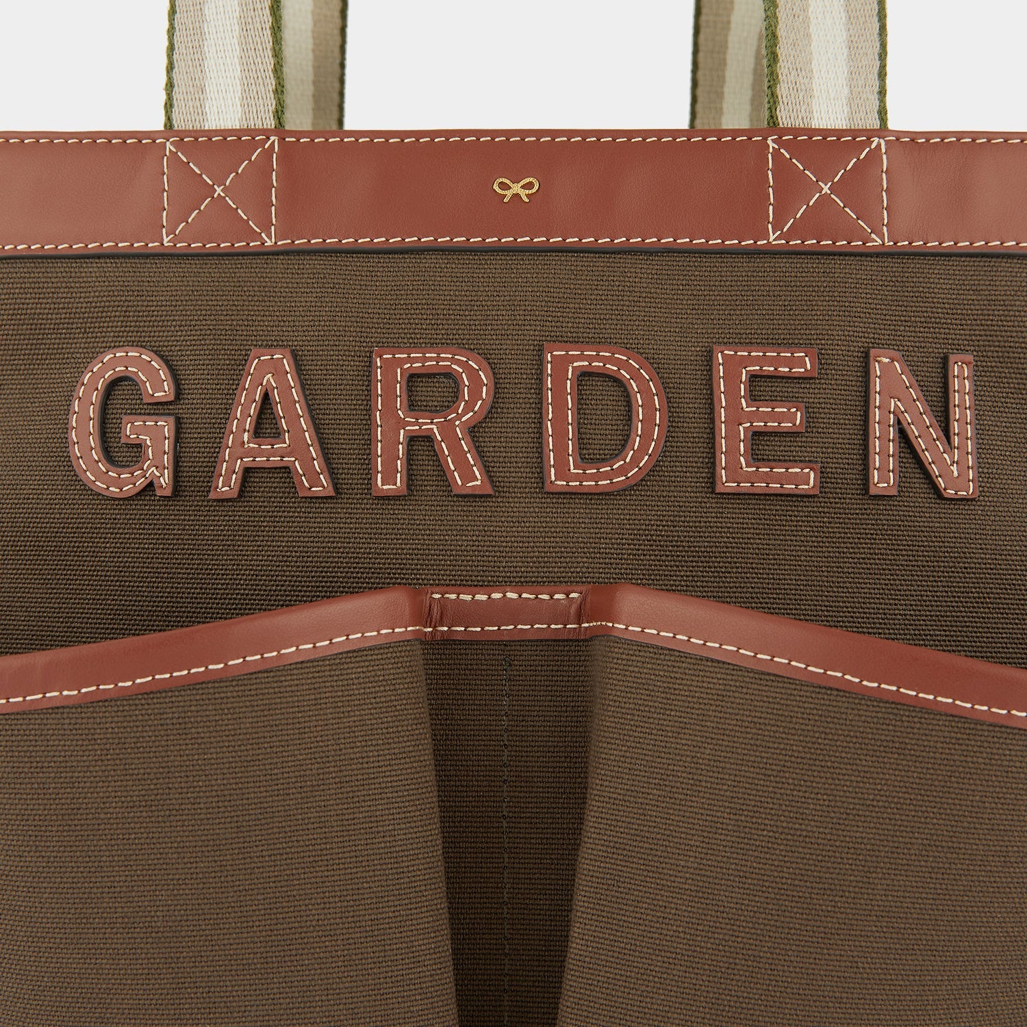 Gardening Tote -

                  
                    Recycled Canvas in Olive -
                  

                  Anya Hindmarch US
