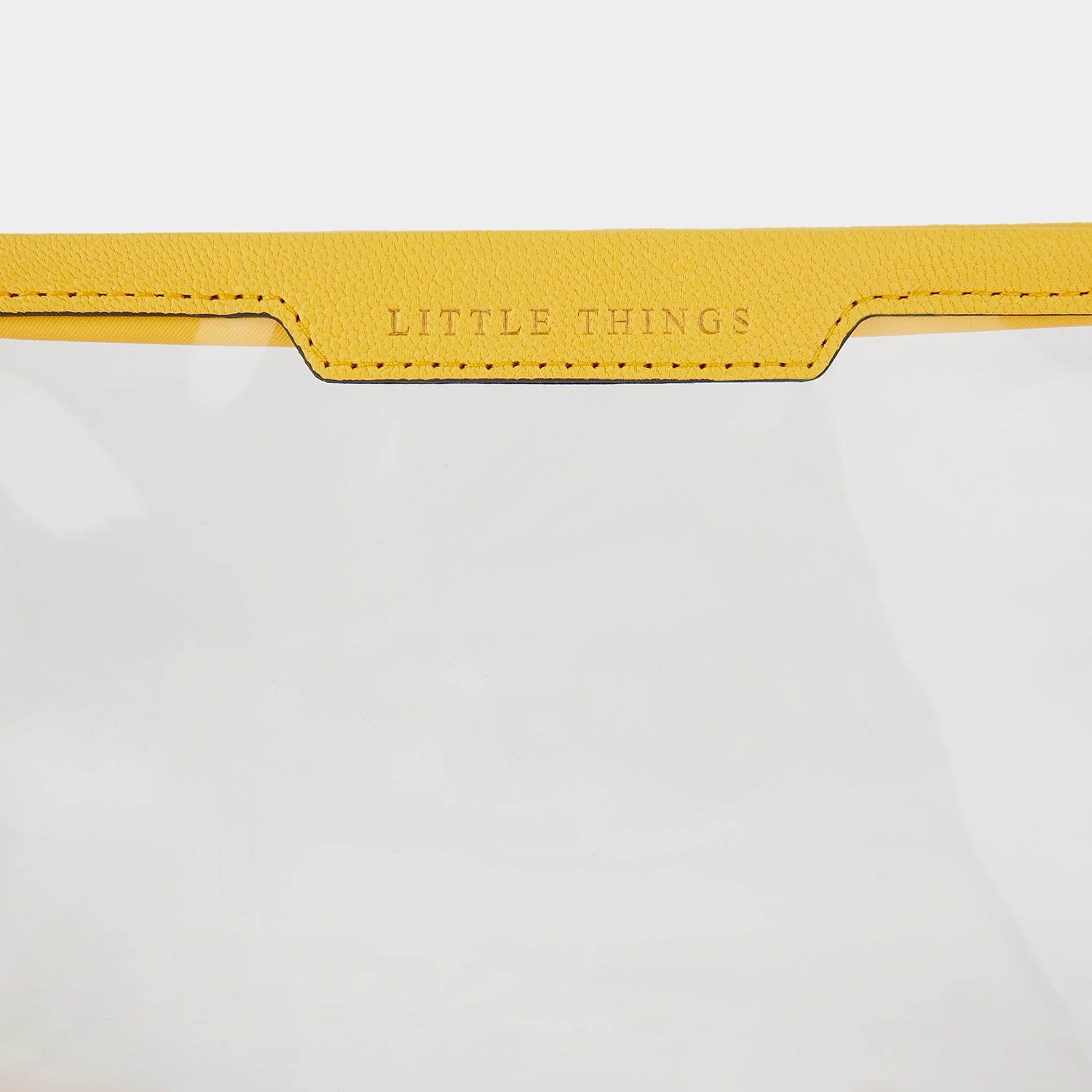Little Things Pouch -

                  
                    Capra Leather in Yellow -
                  

                  Anya Hindmarch US
