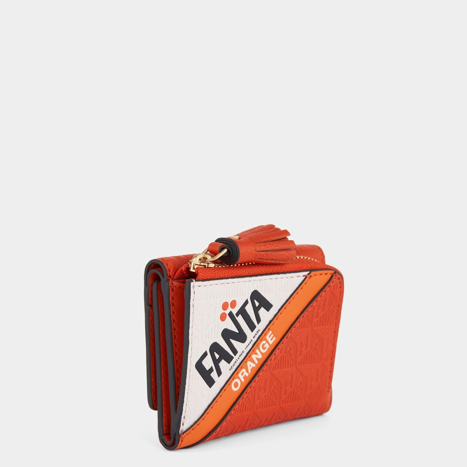 Anya Brands Fanta Mini Trifold Zip Wallet -

                  
                    Capra Leather in Clementine -
                  

                  Anya Hindmarch US
