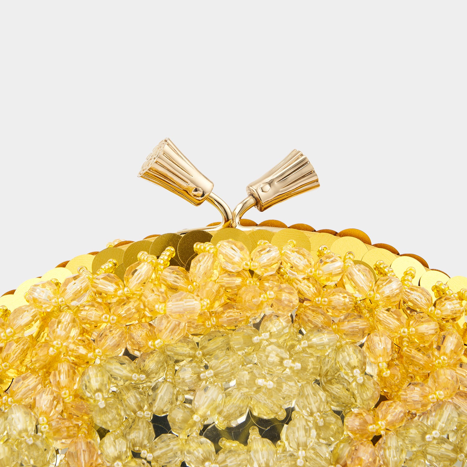 Lemon Maud Tassel Clutch -

                  
                    Beads in Bright Lemon -
                  

                  Anya Hindmarch US
