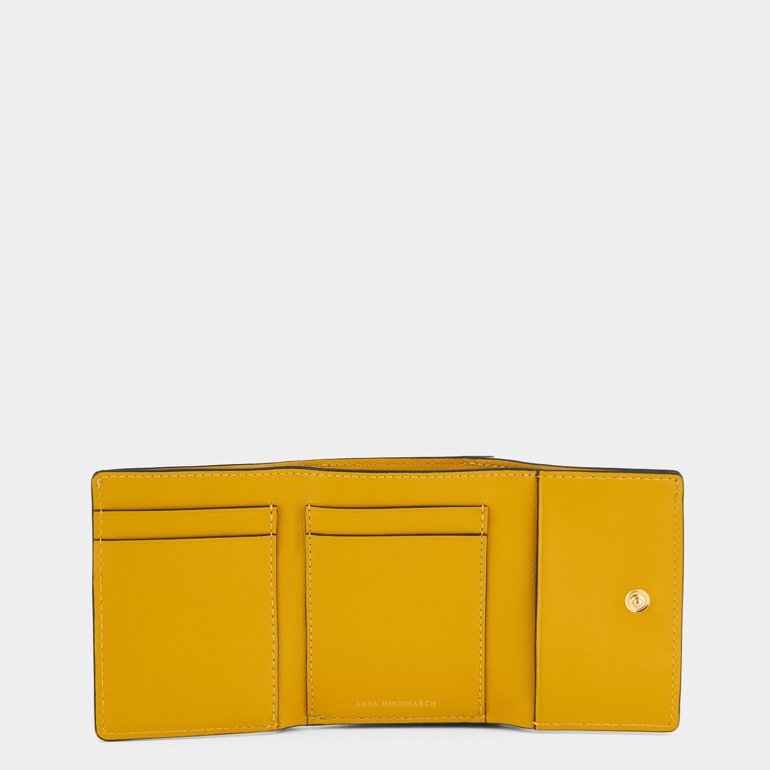 Zany Mini Trifold -

                  
                    Capra in Yellow -
                  

                  Anya Hindmarch US
