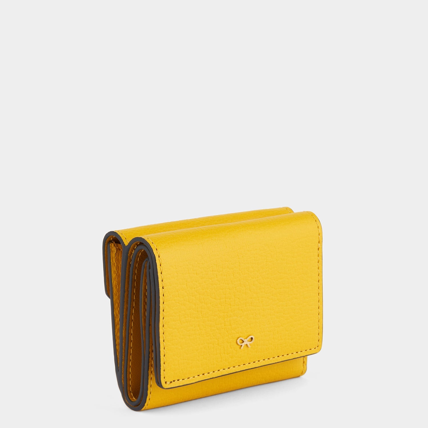 Zany Mini Trifold -

                  
                    Capra in Yellow -
                  

                  Anya Hindmarch US

