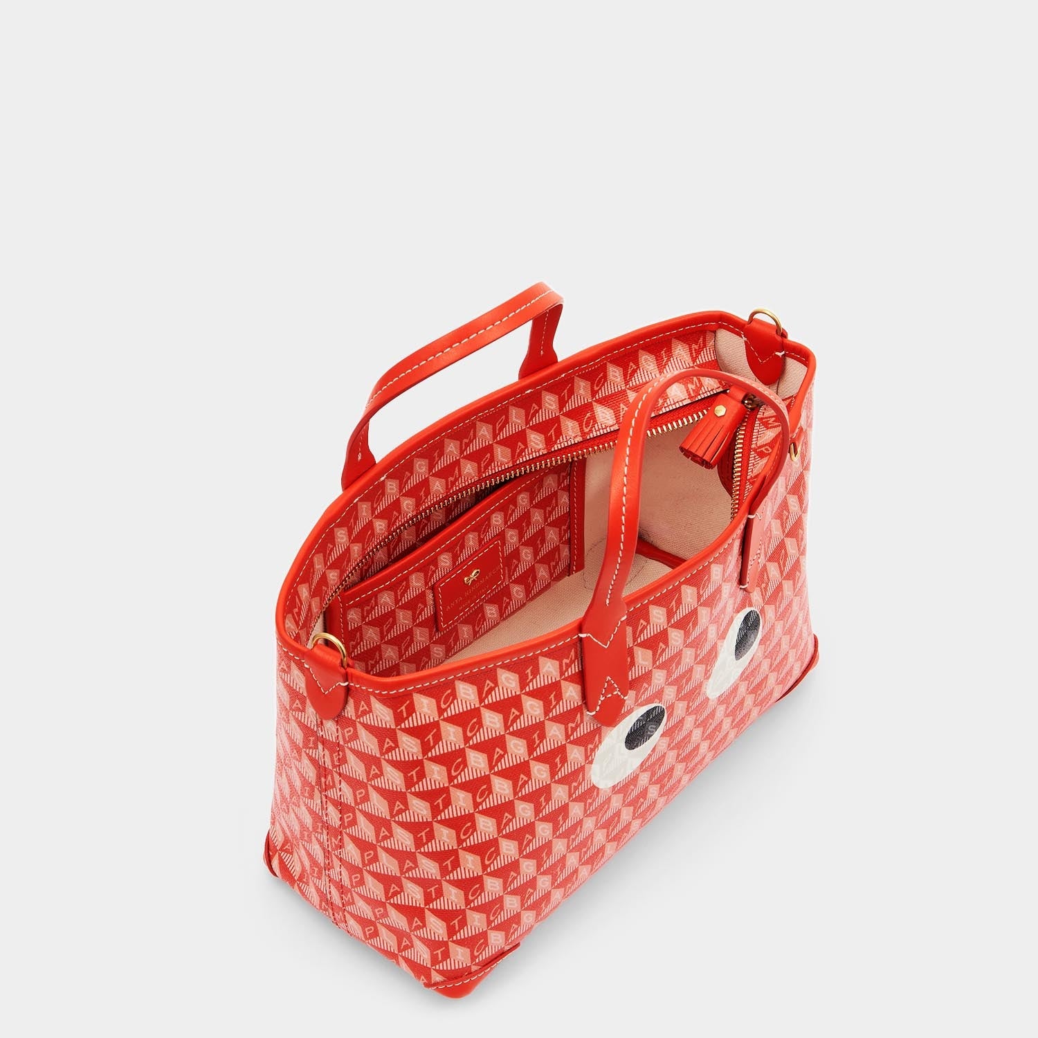 I Am A Plastic Bag XS Eyes Tote -

                  
                    Recycled Canvas in Dark Flame Red -
                  

                  Anya Hindmarch US
