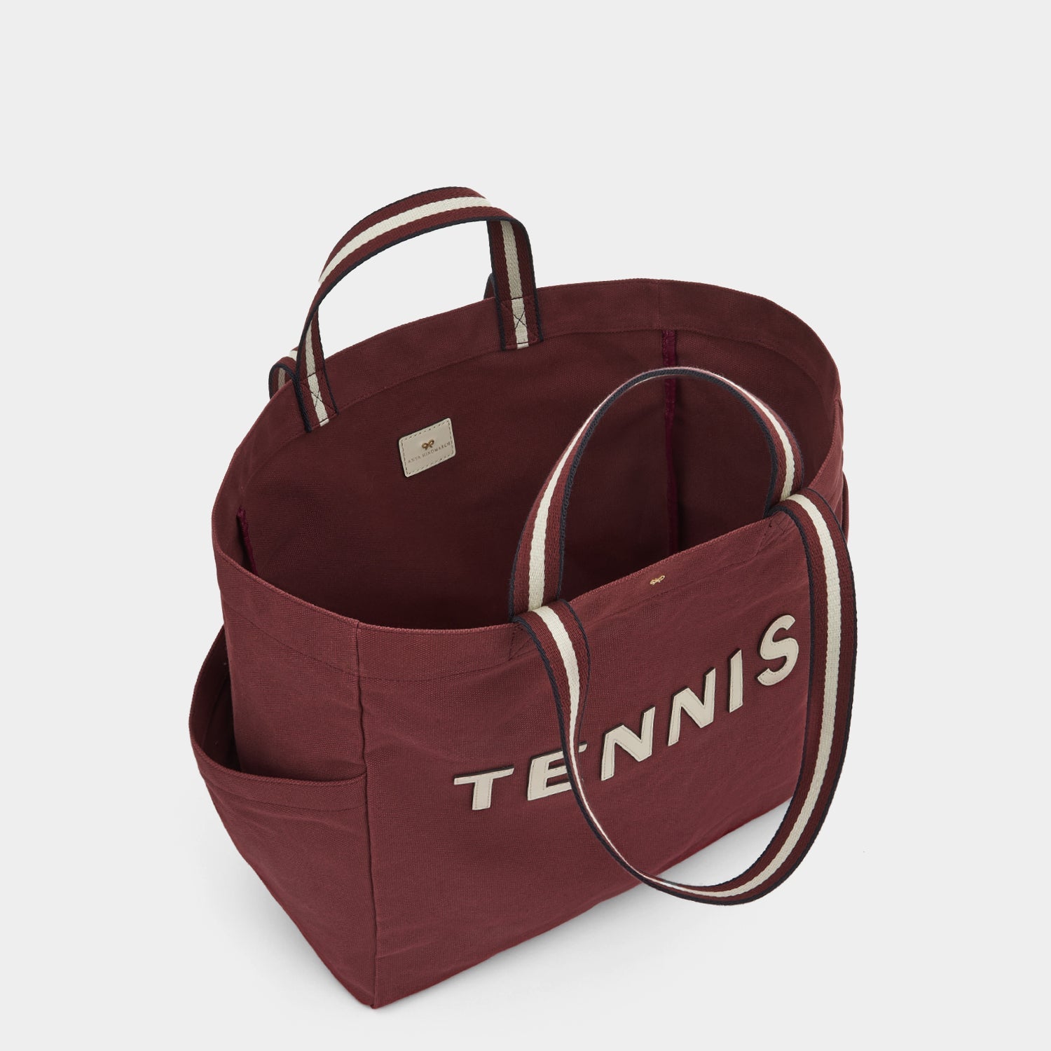 Tennis Household Tote -

                  
                    Recycled Canvas in Medium Red -
                  

                  Anya Hindmarch US

