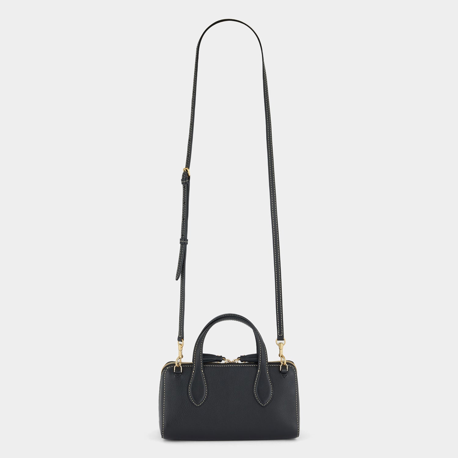 Small Wedge Cross-body -

                  
                    Calf Leather in Black -
                  

                  Anya Hindmarch US
