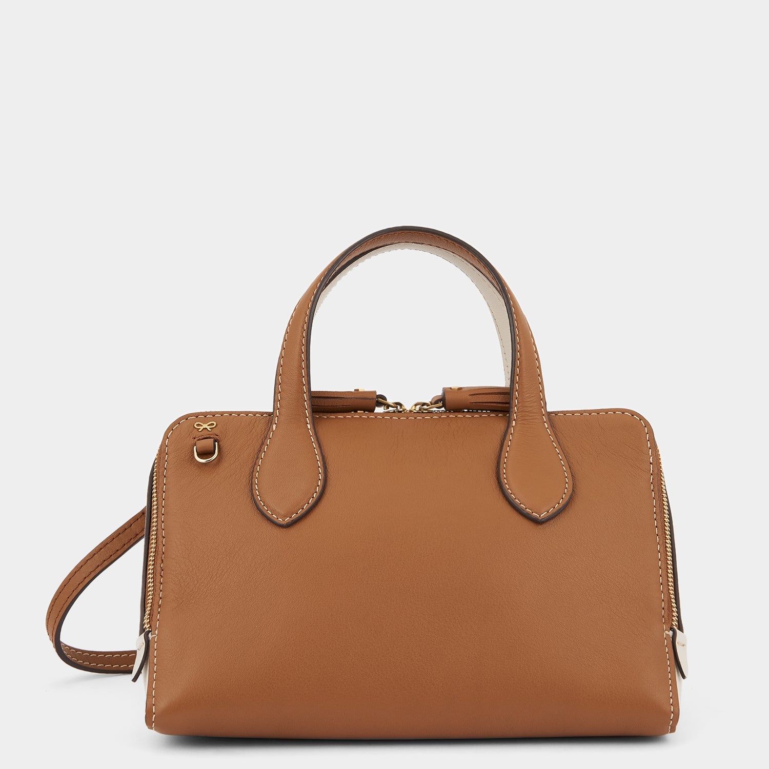 Small Wedge Cross-body -

                  
                    Calf Leather in Pecan/Chalk -
                  

                  Anya Hindmarch US
