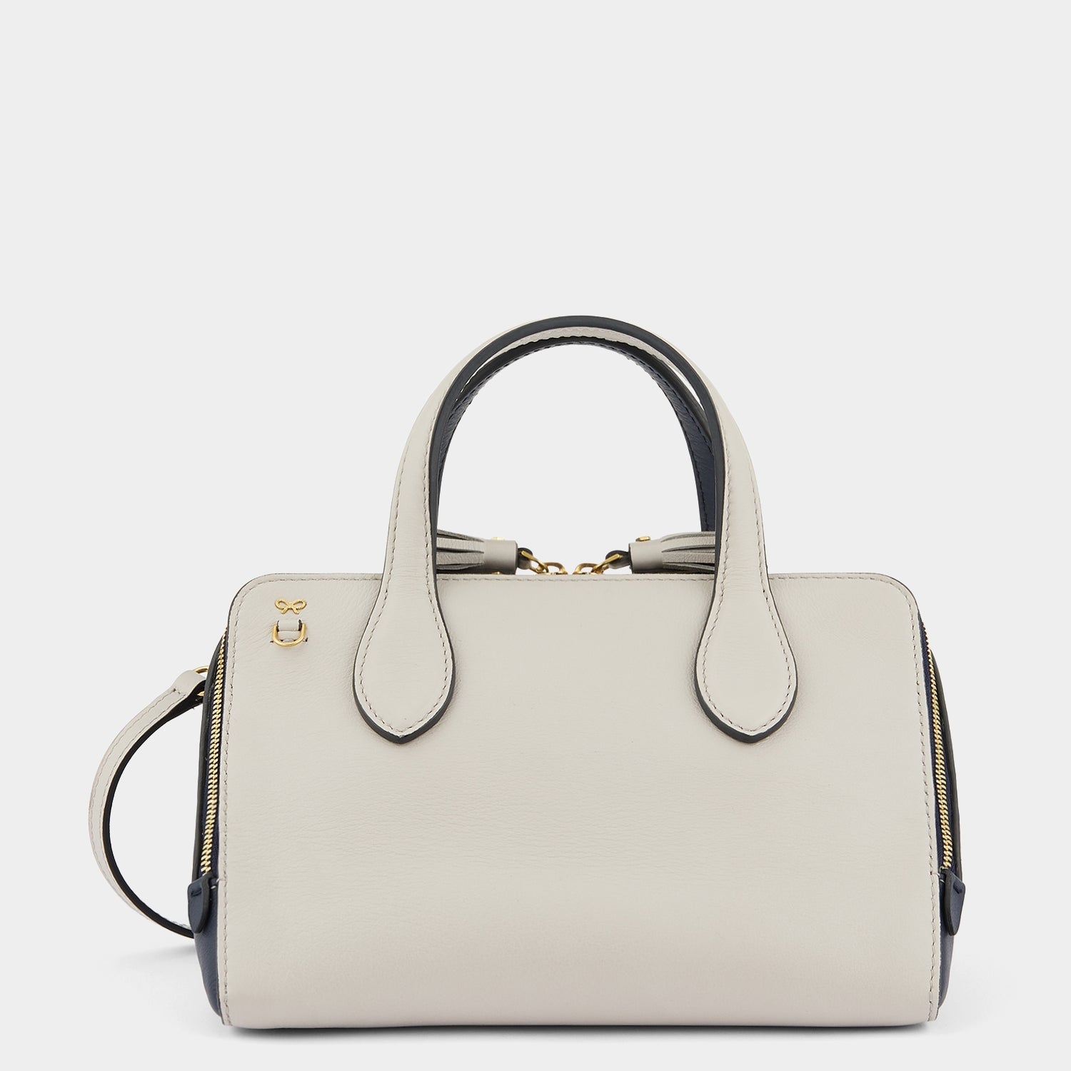 Small Wedge Cross-body -

                  
                    Capra Leather in Steam -
                  

                  Anya Hindmarch US

