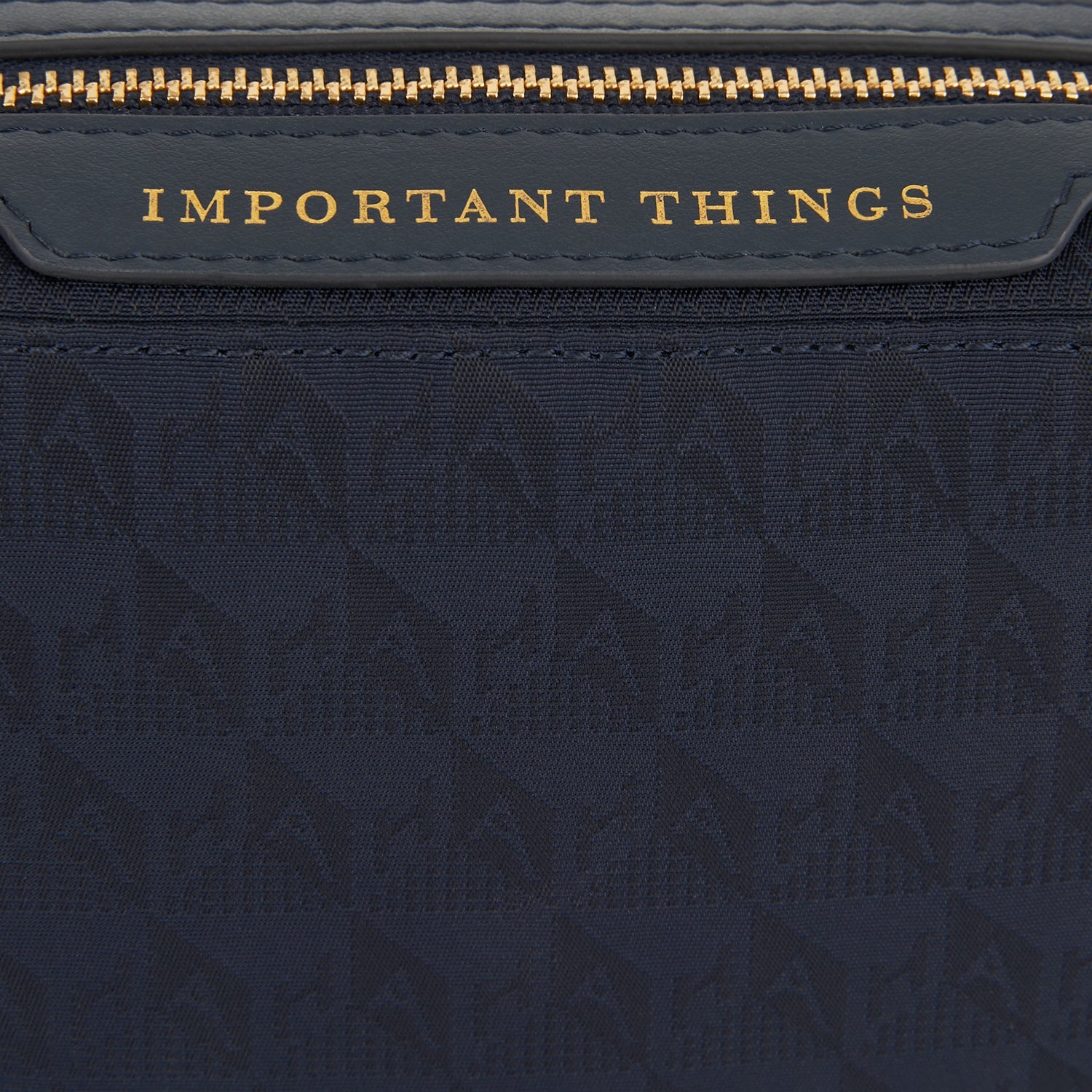 Logo Important Things Pouch -

                  
                    Jacquard Nylon in Marine -
                  

                  Anya Hindmarch US
