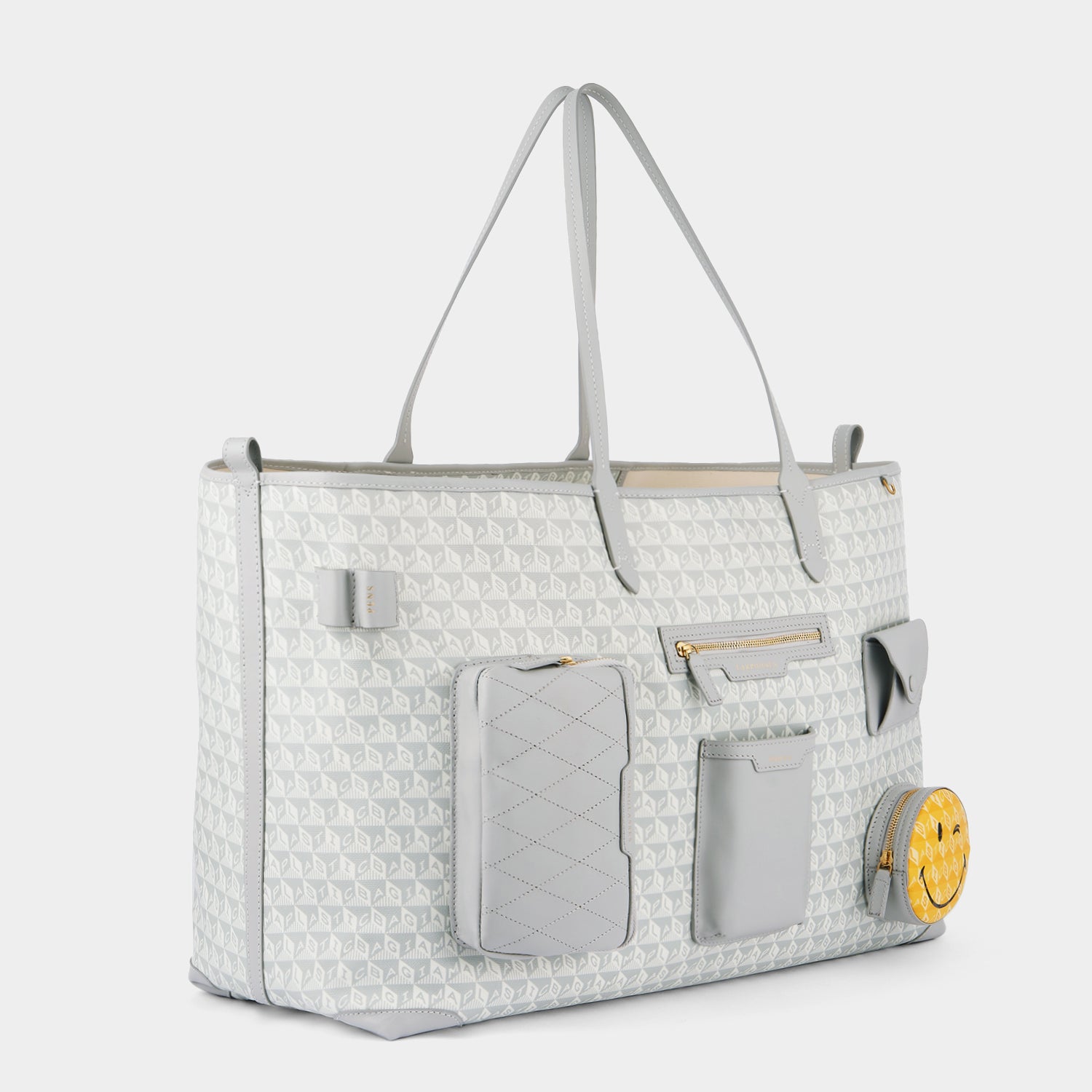 I am a Plastic Bag Wink XL Tote -

                  
                    Recycled Canvas in Frost -
                  

                  Anya Hindmarch US
