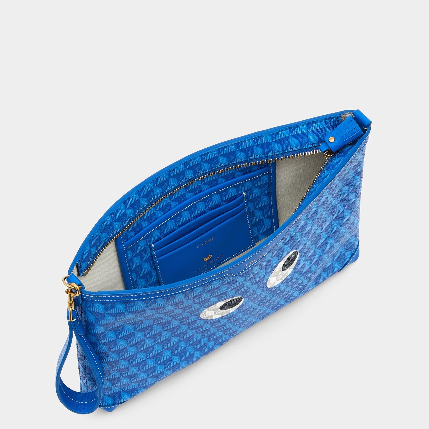 I Am A Plastic Bag Eyes Pochette -

                  
                    Recycled Canvas in Electric Blue -
                  

                  Anya Hindmarch US
