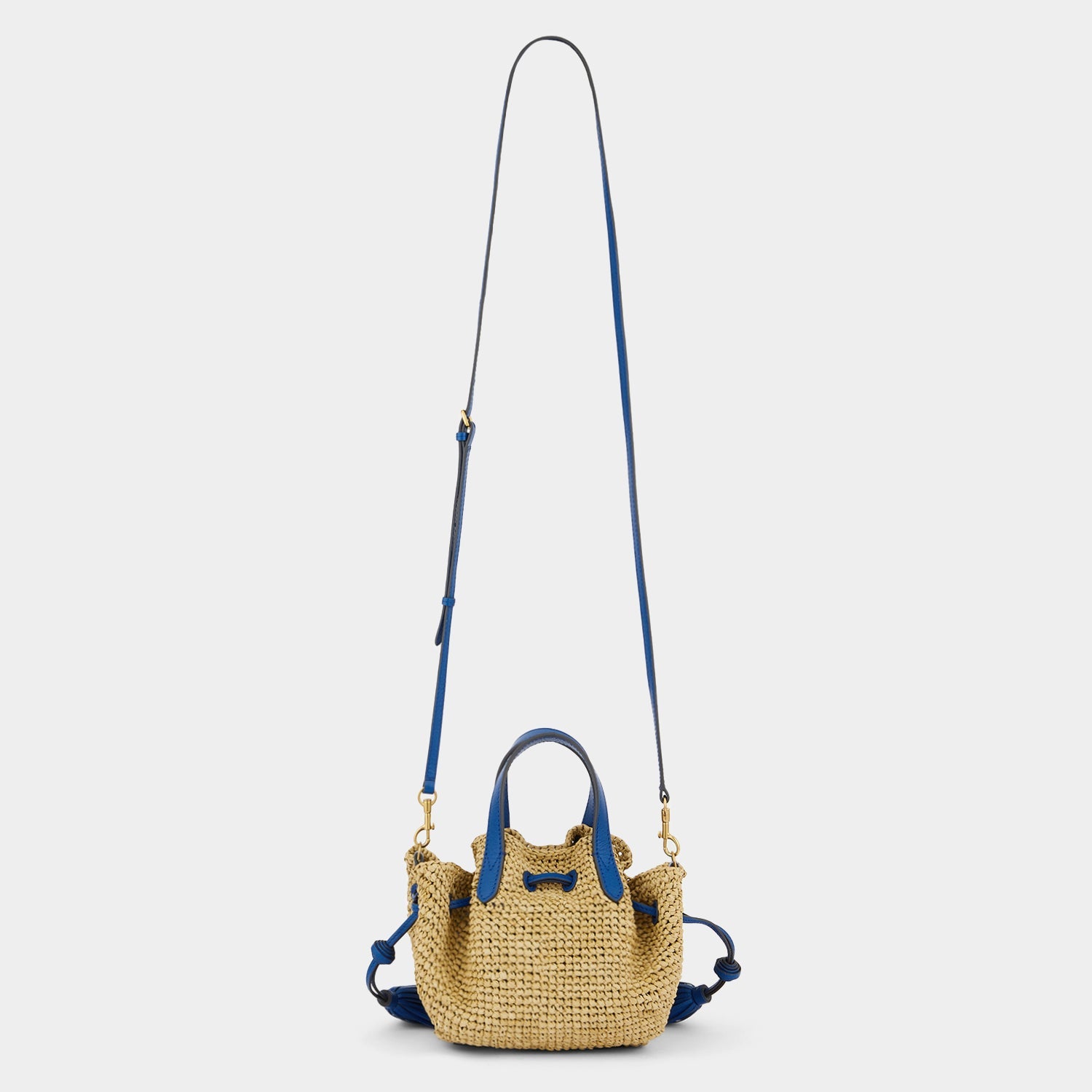 Raffia Drawstring Small Tote -

                  
                    Leather in Electric Blue -
                  

                  Anya Hindmarch US
