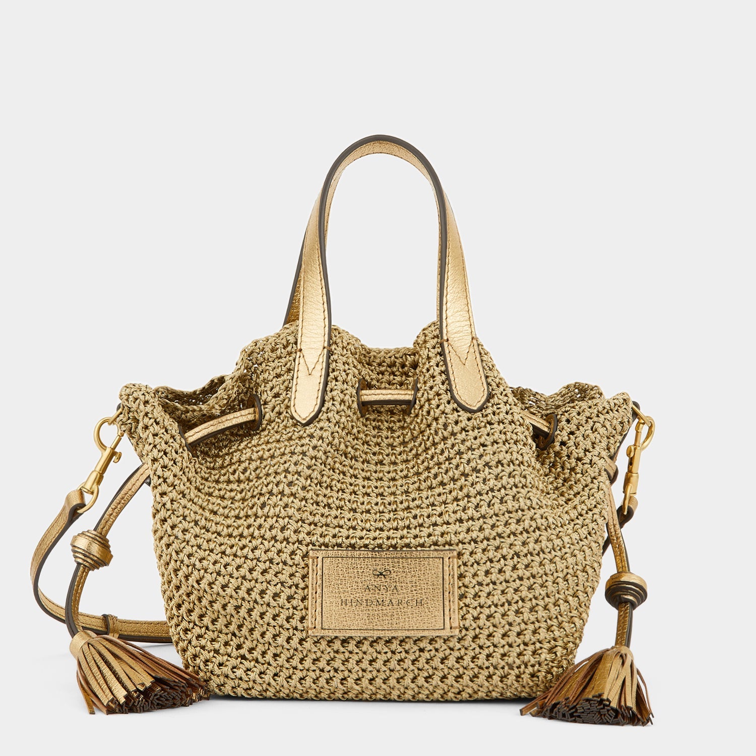 Lurex Drawstring Small Tote -

                  
                    Leather in Gold -
                  

                  Anya Hindmarch US
