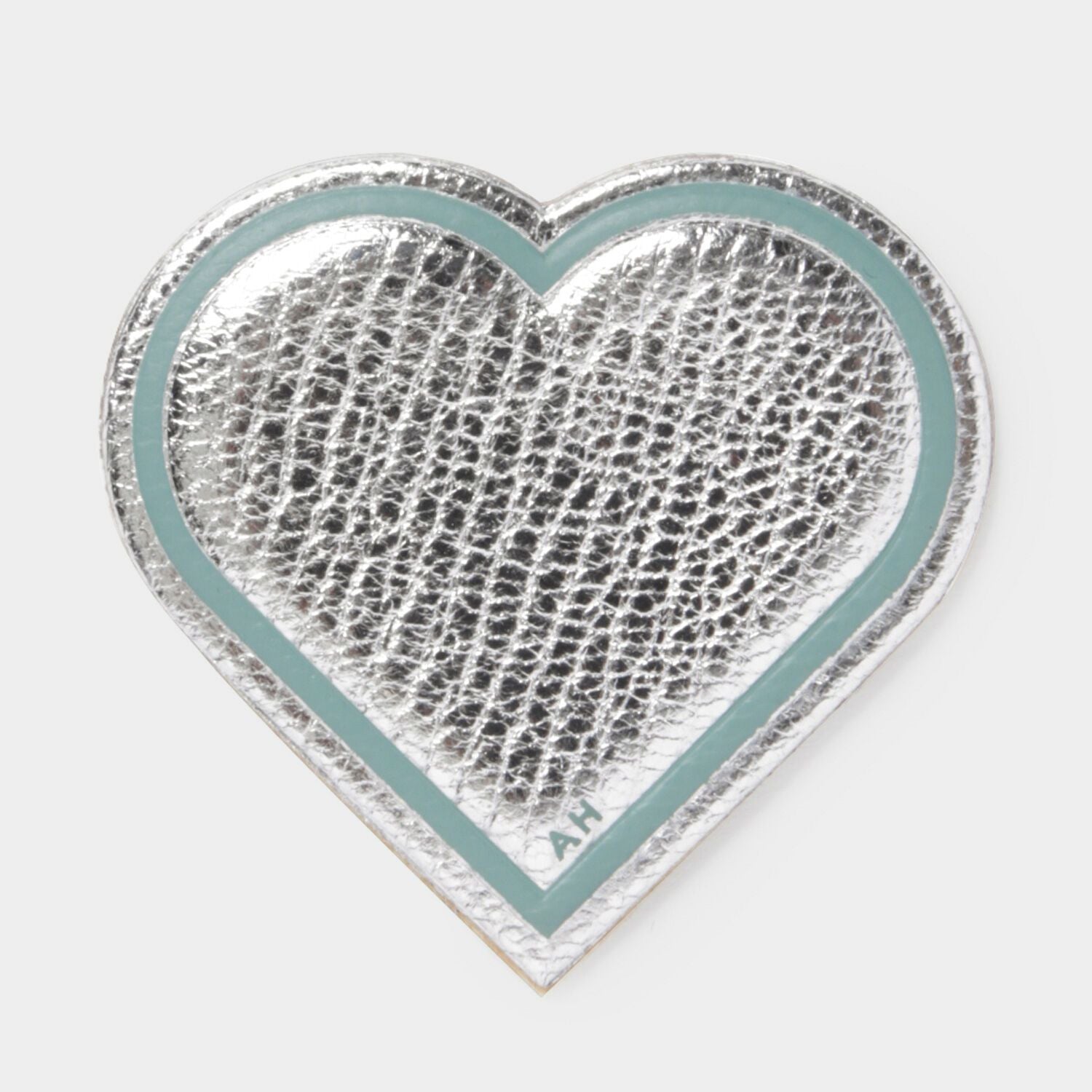 Heart Leather Sticker -

                  
                    Metallic Capra in Silver -
                  

                  Anya Hindmarch US

