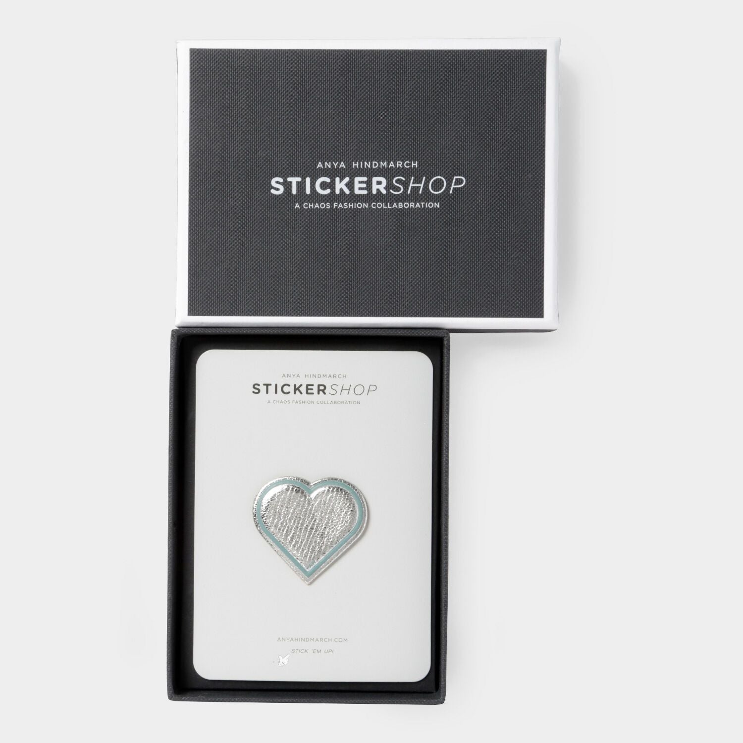 Heart Leather Sticker -

                  
                    Metallic Capra in Silver -
                  

                  Anya Hindmarch US
