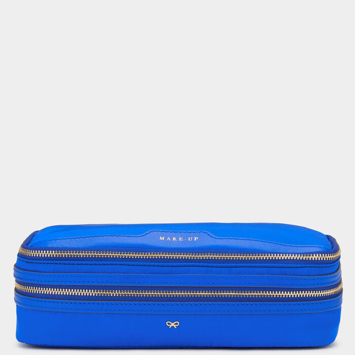 Make-Up Pouch -

                  
                    Recycled Nylon in Electric Blue -
                  

                  Anya Hindmarch US
