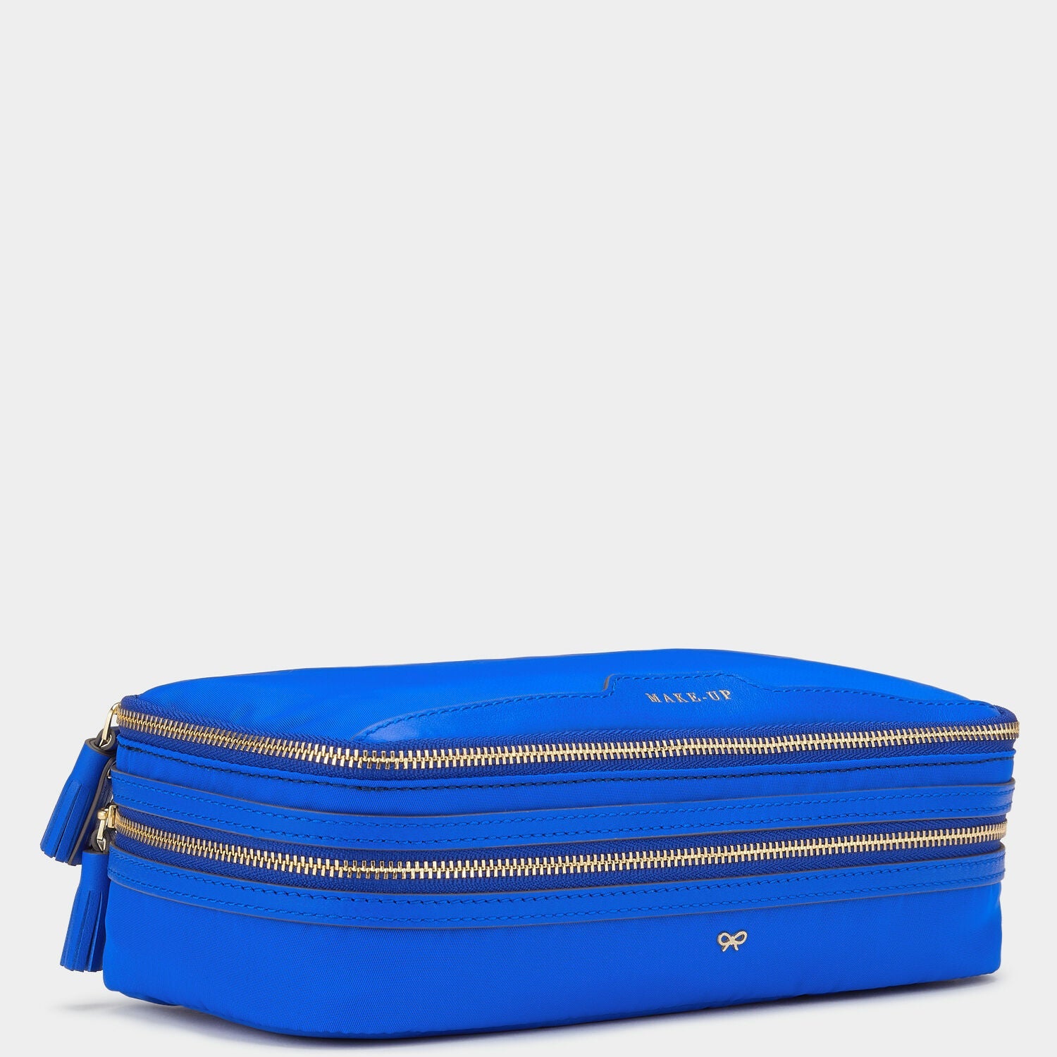Make-Up Pouch -

                  
                    Recycled Nylon in Electric Blue -
                  

                  Anya Hindmarch US
